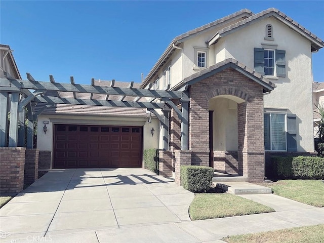 view of front of property with a pergola and a garage