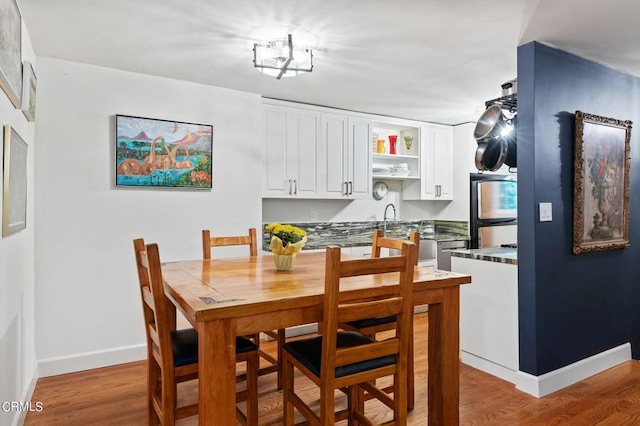 dining room featuring light hardwood / wood-style floors