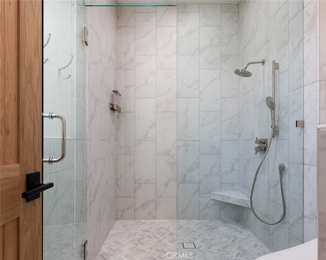 bathroom with an enclosed shower