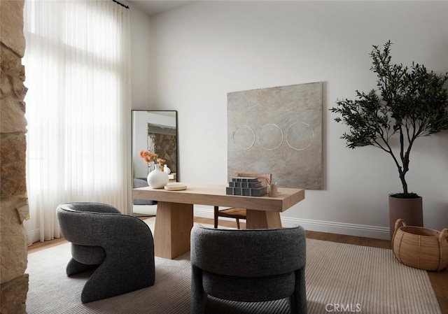 home office with hardwood / wood-style floors