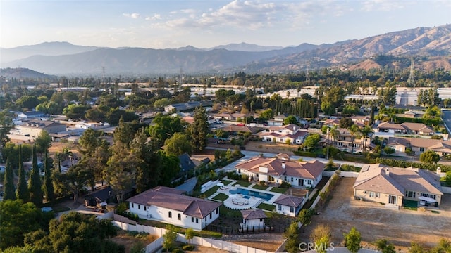 drone / aerial view featuring a mountain view