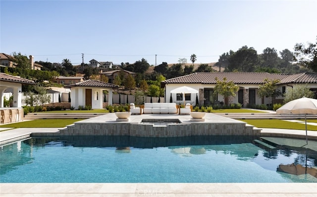 view of pool featuring a patio