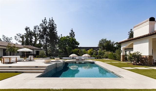 view of pool with a patio area