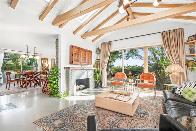 living room featuring beamed ceiling, concrete flooring, and high vaulted ceiling