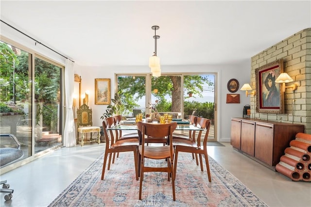 dining room featuring a wealth of natural light