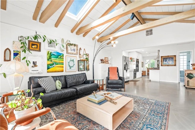 living room featuring beam ceiling, high vaulted ceiling, and concrete floors