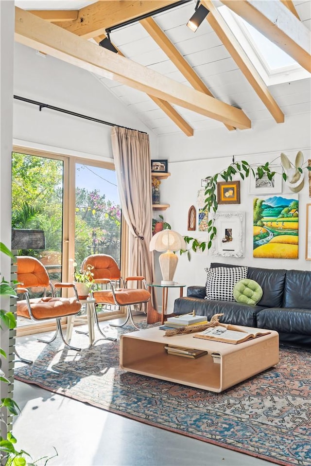 interior space with beamed ceiling and high vaulted ceiling