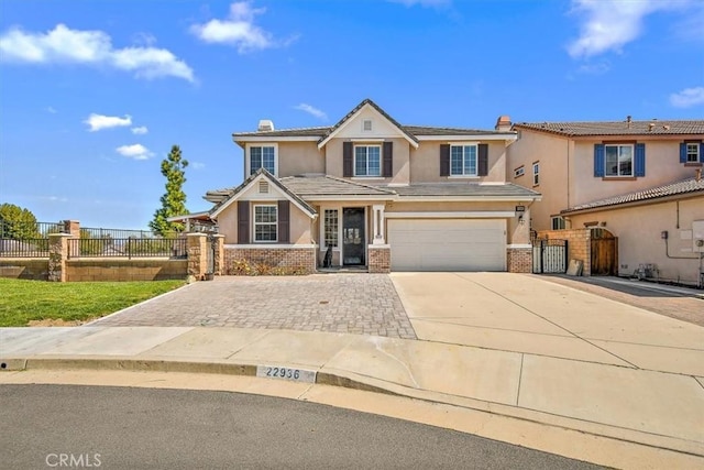 view of front of property featuring a garage