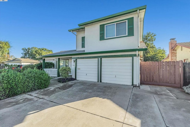 front of property featuring a garage