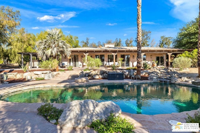 view of pool with a patio area