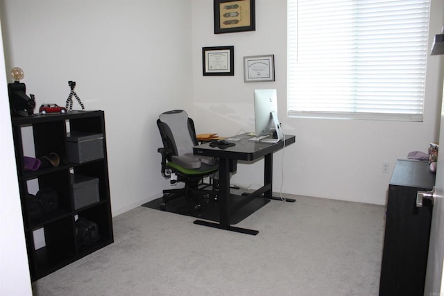 view of carpeted office space