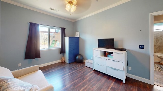 living area featuring crown molding, dark hardwood / wood-style floors, and ceiling fan