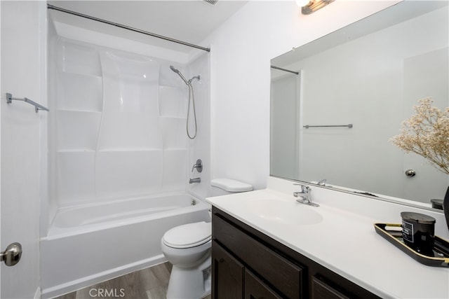 full bathroom featuring vanity, shower / tub combination, wood-type flooring, and toilet