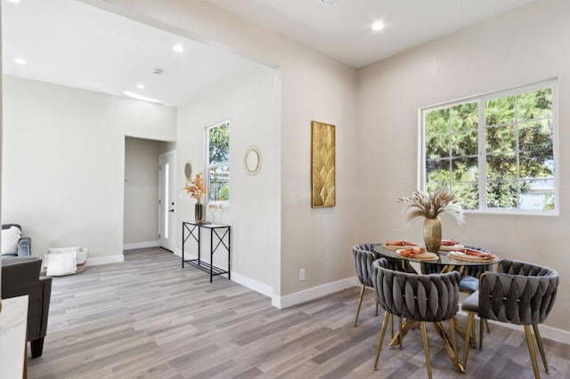 dining area with light wood-type flooring