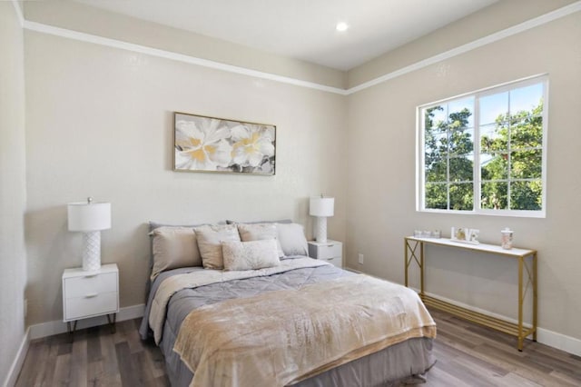 bedroom featuring hardwood / wood-style flooring