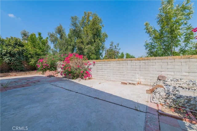 view of patio featuring a fenced backyard