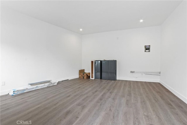 unfurnished room featuring light hardwood / wood-style flooring