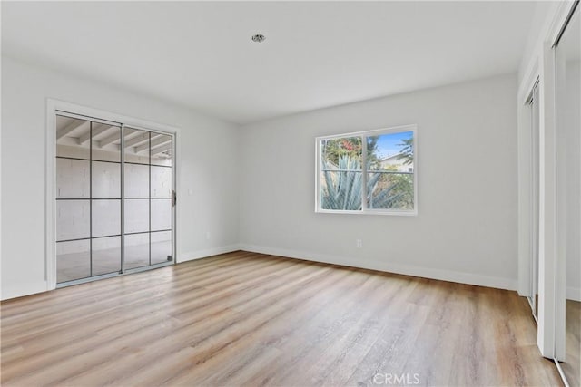 unfurnished bedroom with light hardwood / wood-style floors