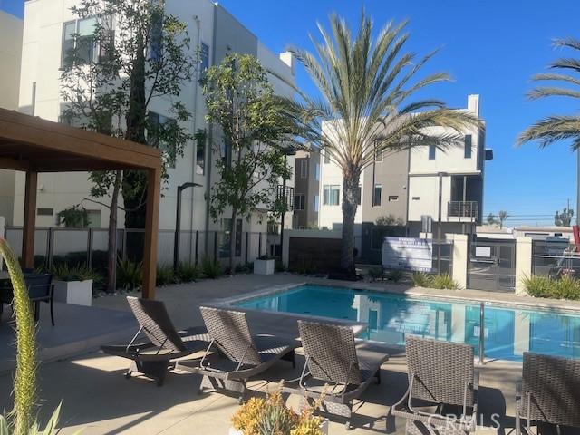 view of swimming pool with a patio