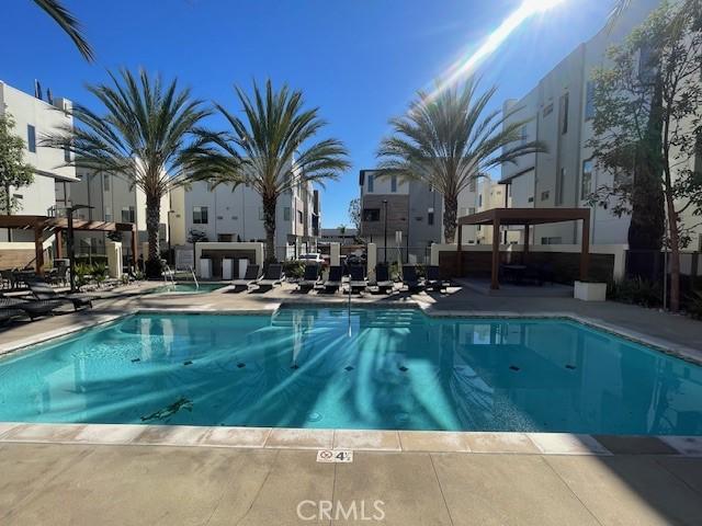 view of swimming pool featuring a patio