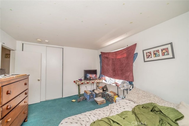 bedroom with carpet floors and a closet