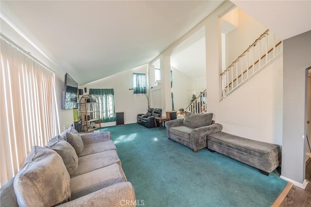 living room featuring hardwood / wood-style floors and lofted ceiling