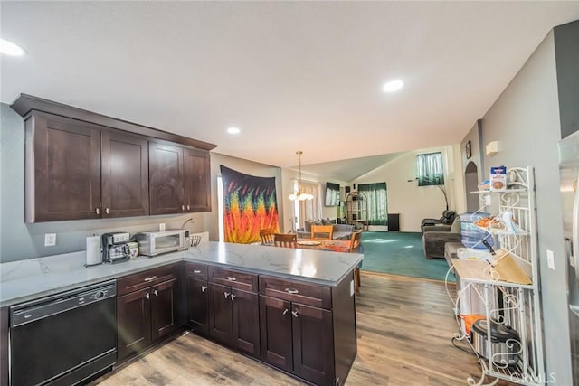 kitchen with kitchen peninsula, dishwasher, lofted ceiling, and light wood-type flooring