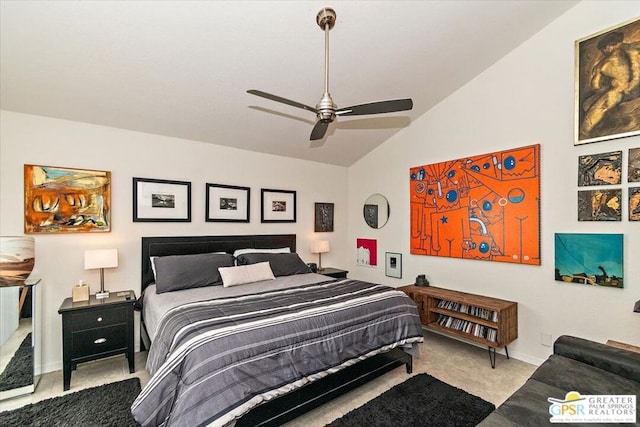 bedroom with ceiling fan, lofted ceiling, and light carpet