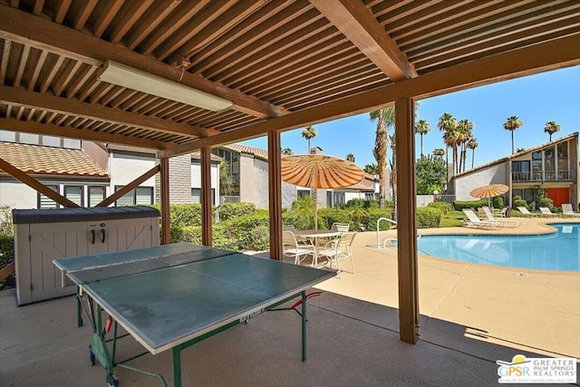 view of patio featuring a community pool