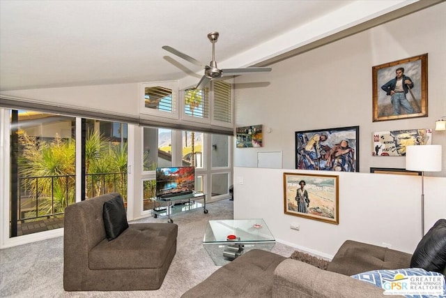 carpeted living room featuring ceiling fan and high vaulted ceiling