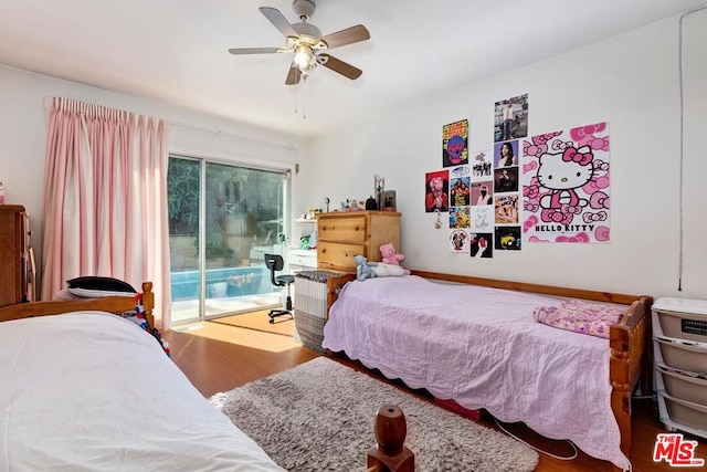 bedroom featuring ceiling fan, access to outside, and hardwood / wood-style floors