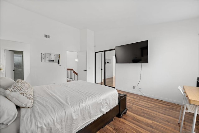 bedroom featuring dark hardwood / wood-style floors