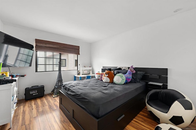 bedroom featuring light hardwood / wood-style floors