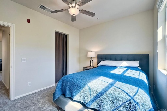 bedroom with ceiling fan and carpet floors