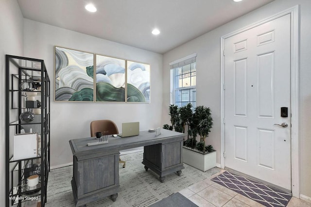 office space with light tile patterned floors