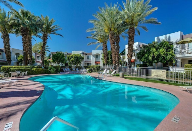 view of swimming pool with a patio area