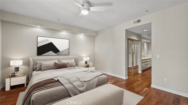 bedroom featuring dark wood-type flooring and ceiling fan