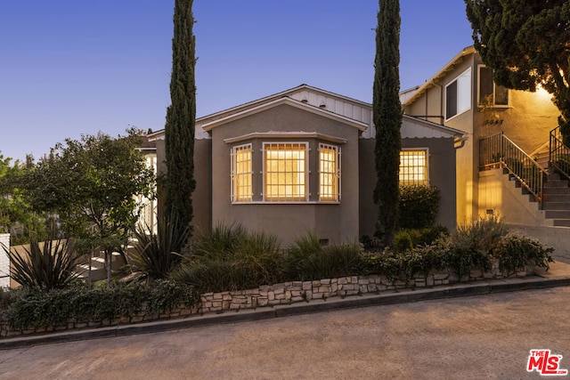 view of property exterior at dusk