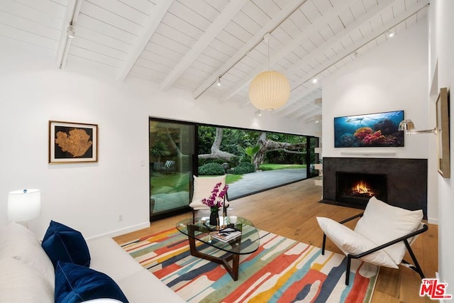 living room with beam ceiling, wooden ceiling, and wood-type flooring