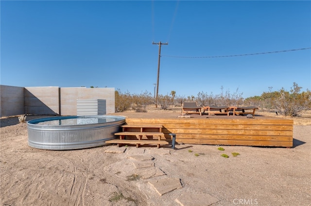 view of yard featuring a hot tub