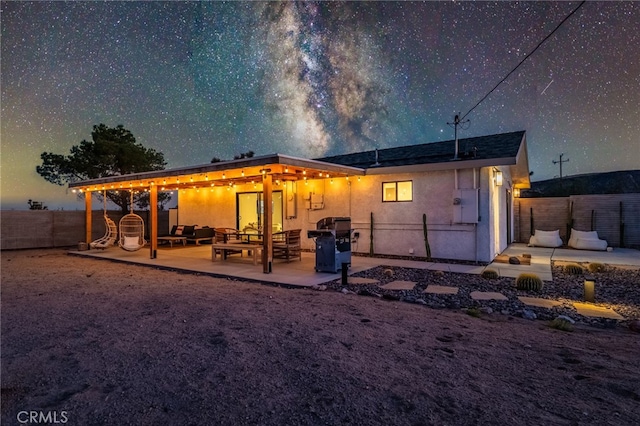 back of house featuring a patio