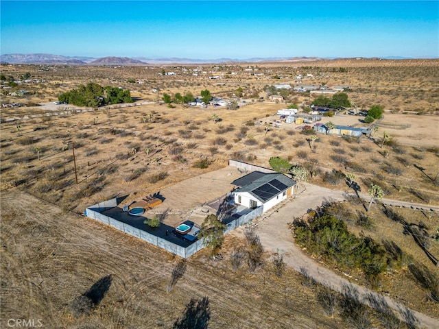 drone / aerial view featuring a rural view and a mountain view