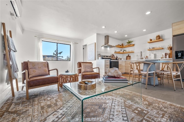 living room featuring concrete floors and a wall unit AC