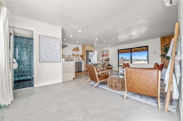 living room featuring sink