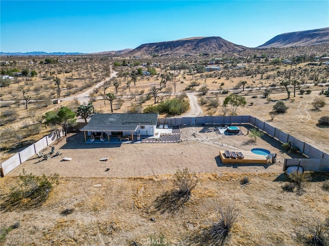 birds eye view of property featuring a mountain view and a rural view