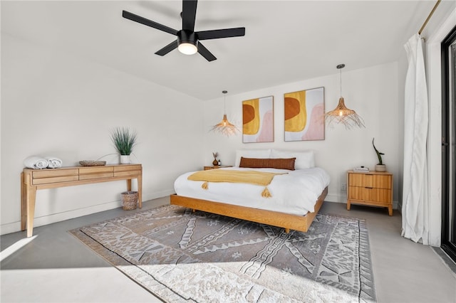 bedroom featuring concrete floors and ceiling fan