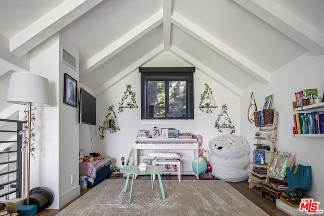 rec room featuring vaulted ceiling with beams and dark wood-type flooring