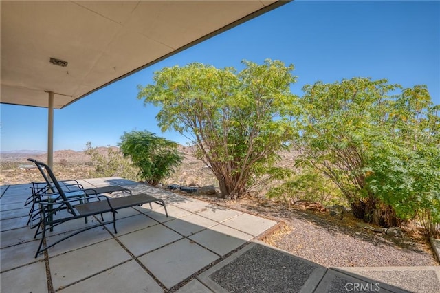 view of patio with a mountain view