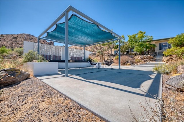 view of patio / terrace with a mail area