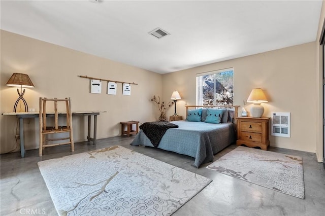 bedroom with concrete flooring